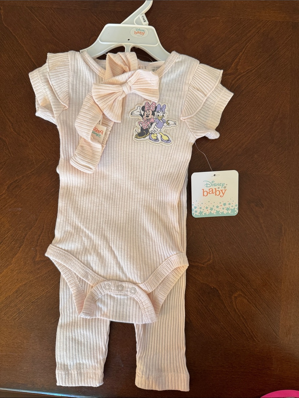 Light pink Minnie onsie with pants and Bow